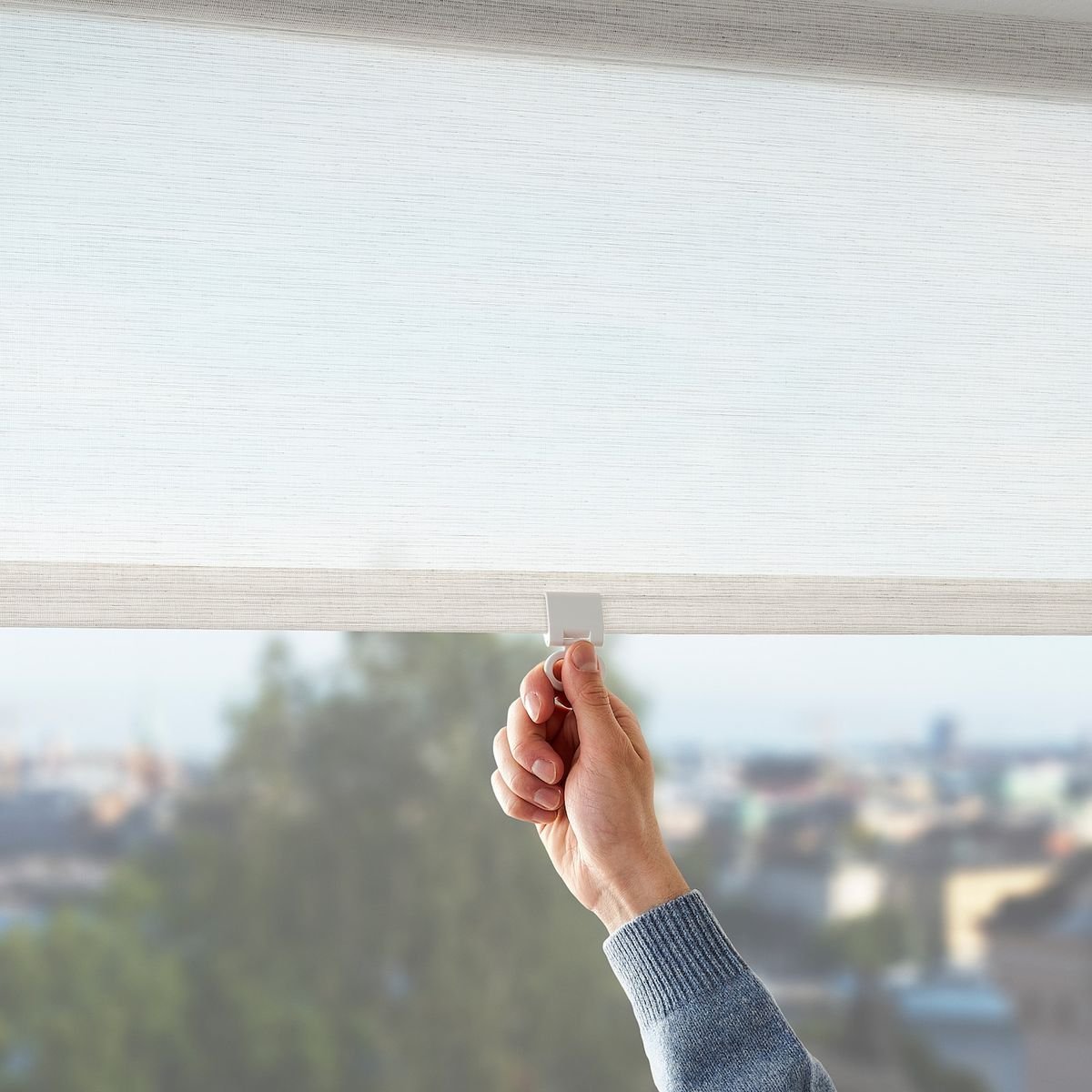 Professional curtains and blinds installation Dubai window treatment experts measuring